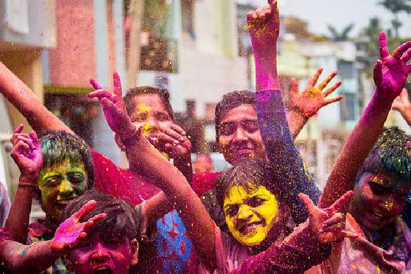 why is holi celebrated with colours